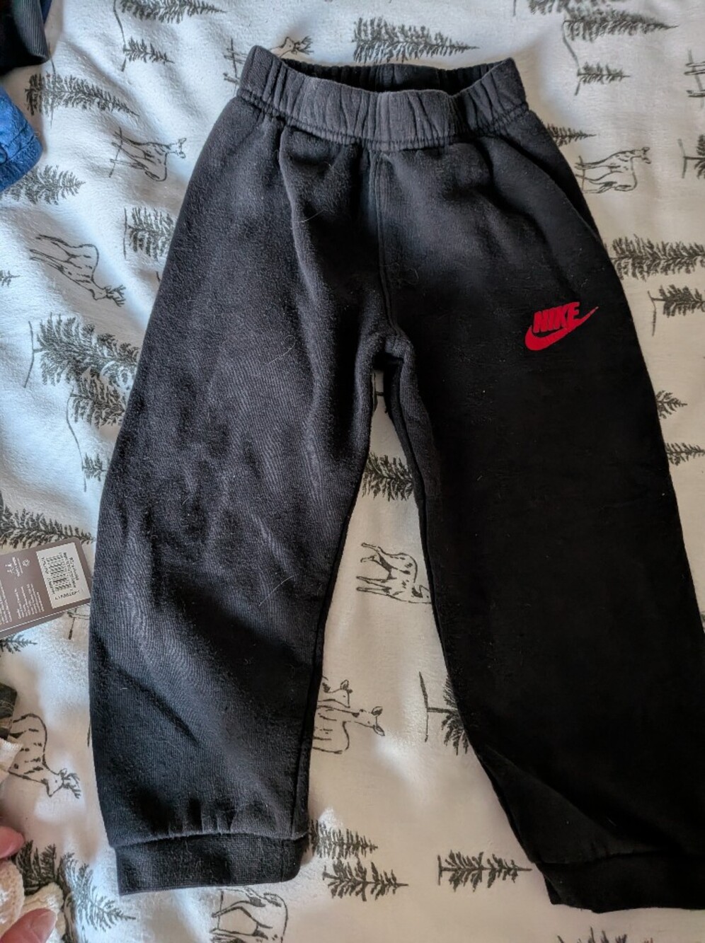 Nike Kids Black Joggers with Red Swoosh